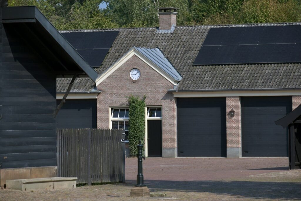 Solar panels in a roof demonstrating the falling cost of clean energy