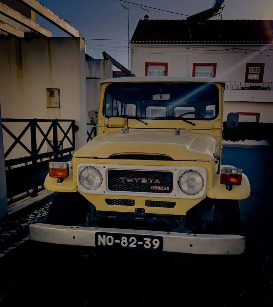 The ROI of Kindness: What AI Cannot Replace 2 yellow Toyota Land Cruiser illustrating Toyota's kindness-first long-term business strategy