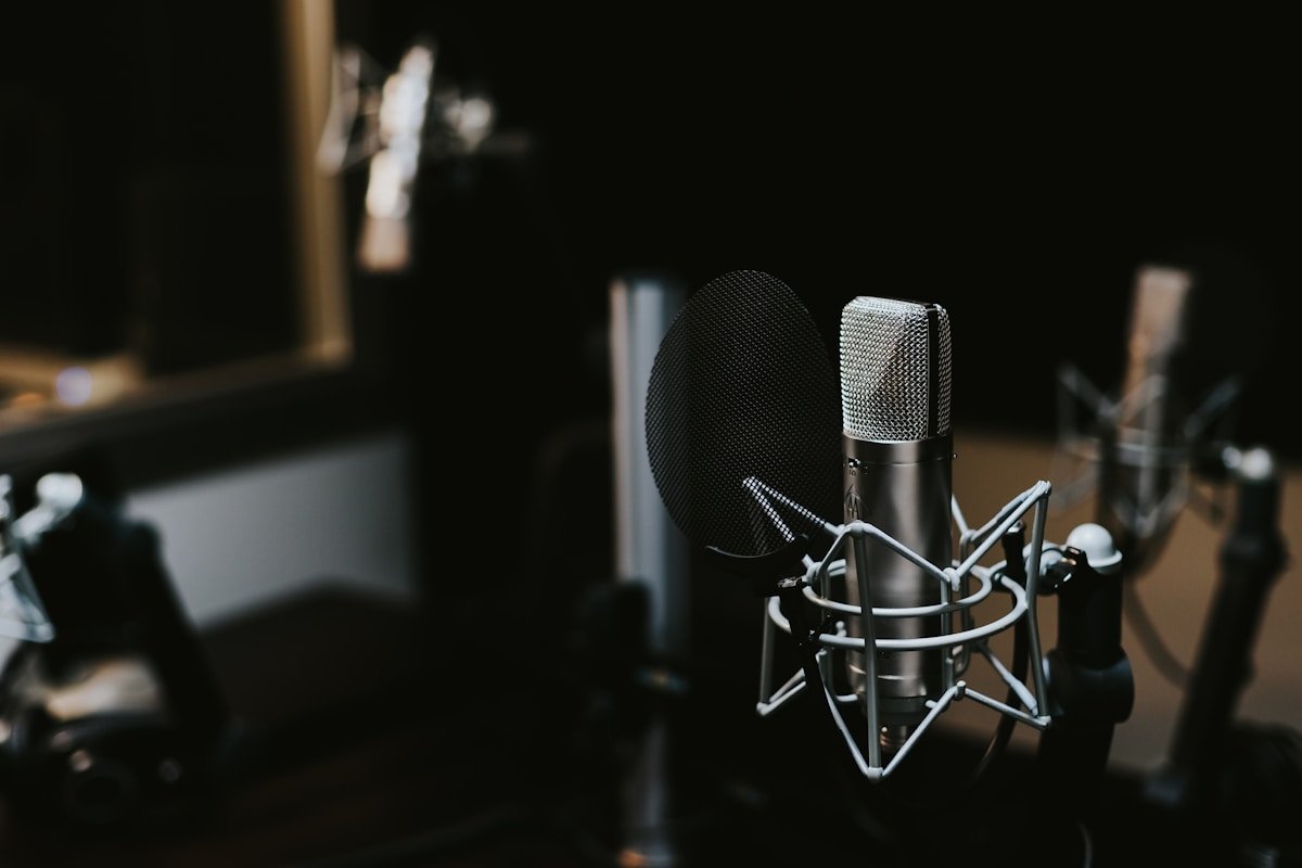 podcast productivity headphones on desk for learning