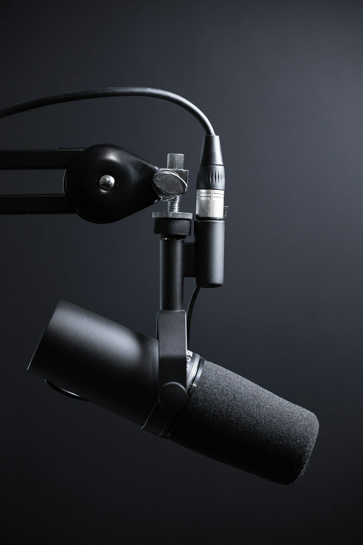 professional using podcasts as a productivity tool at desk