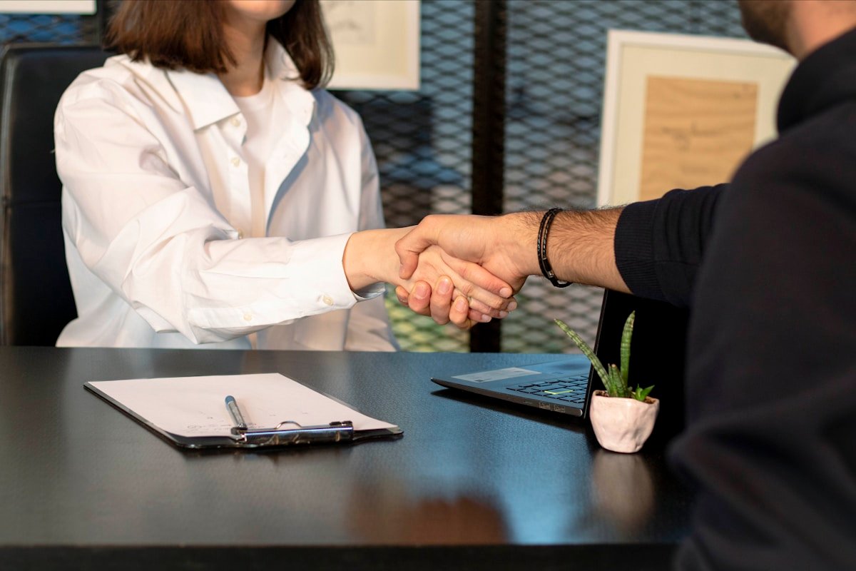 AI Job Search: How to Use AI Without Sounding Like AI 3 Handshake after an interview, the goal of a focused job search strategy